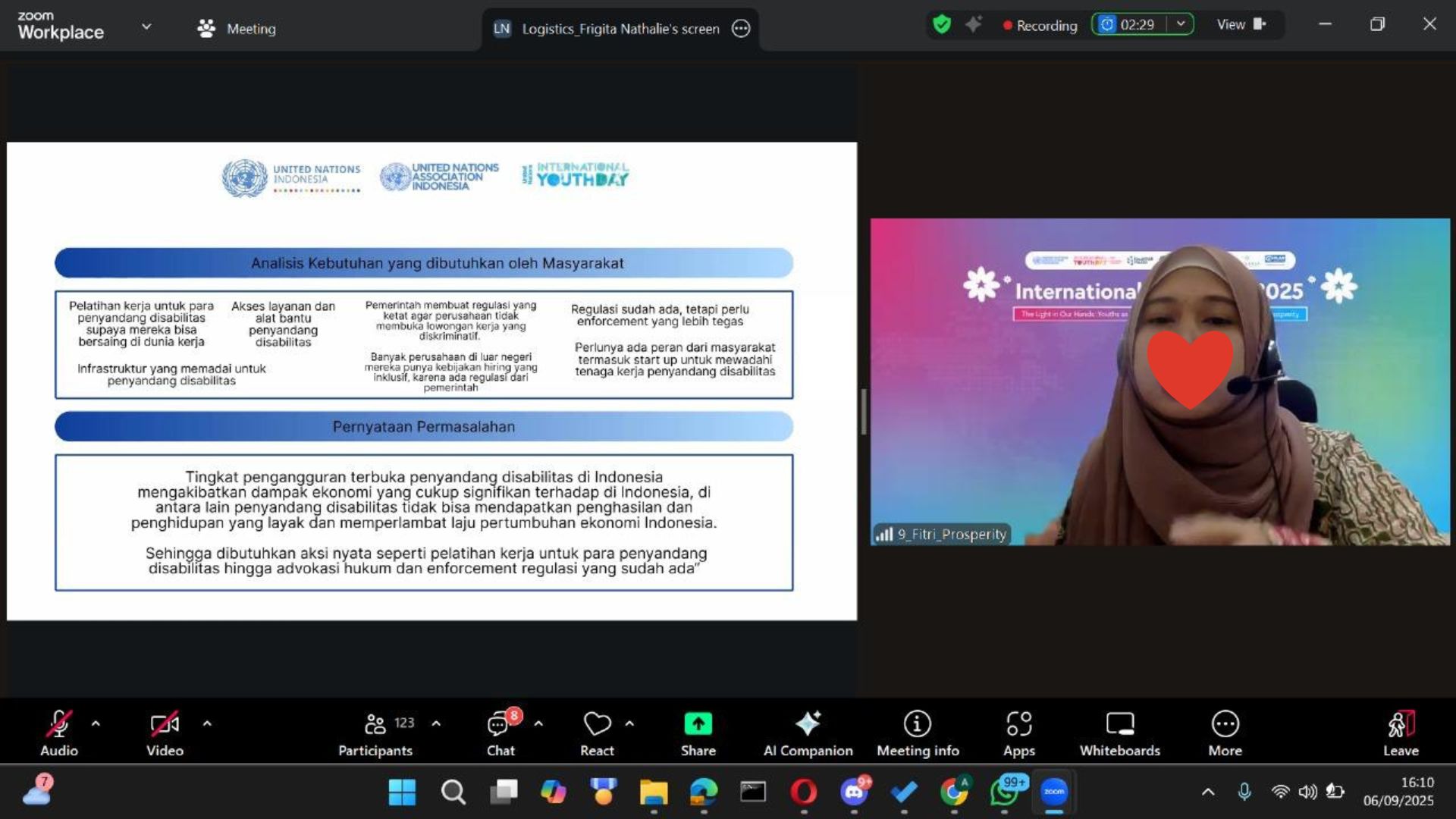 Fitri Apriyani presenting group social project in front of speakers and community leaders at Youth International Day 2025