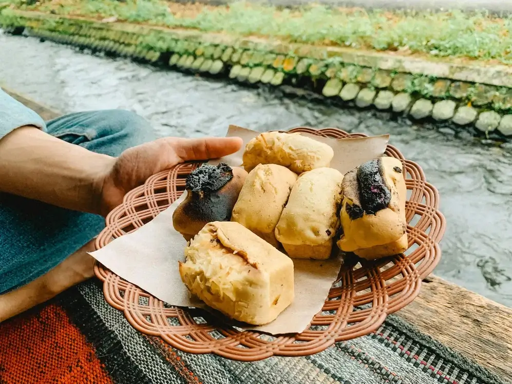 Breakfast with coffee and kue balok at Kang Sute in Purwokerto