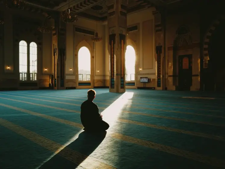 Peaceful moment of prayer representing spiritual support and emotional relief
