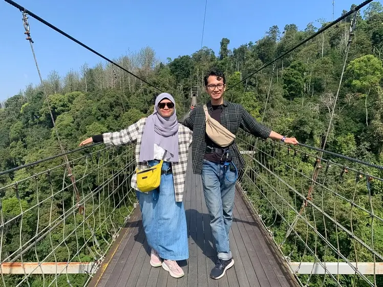 Walking across Jembatan Gantung Lembah Purba in Situ Gunung, Sukabumi